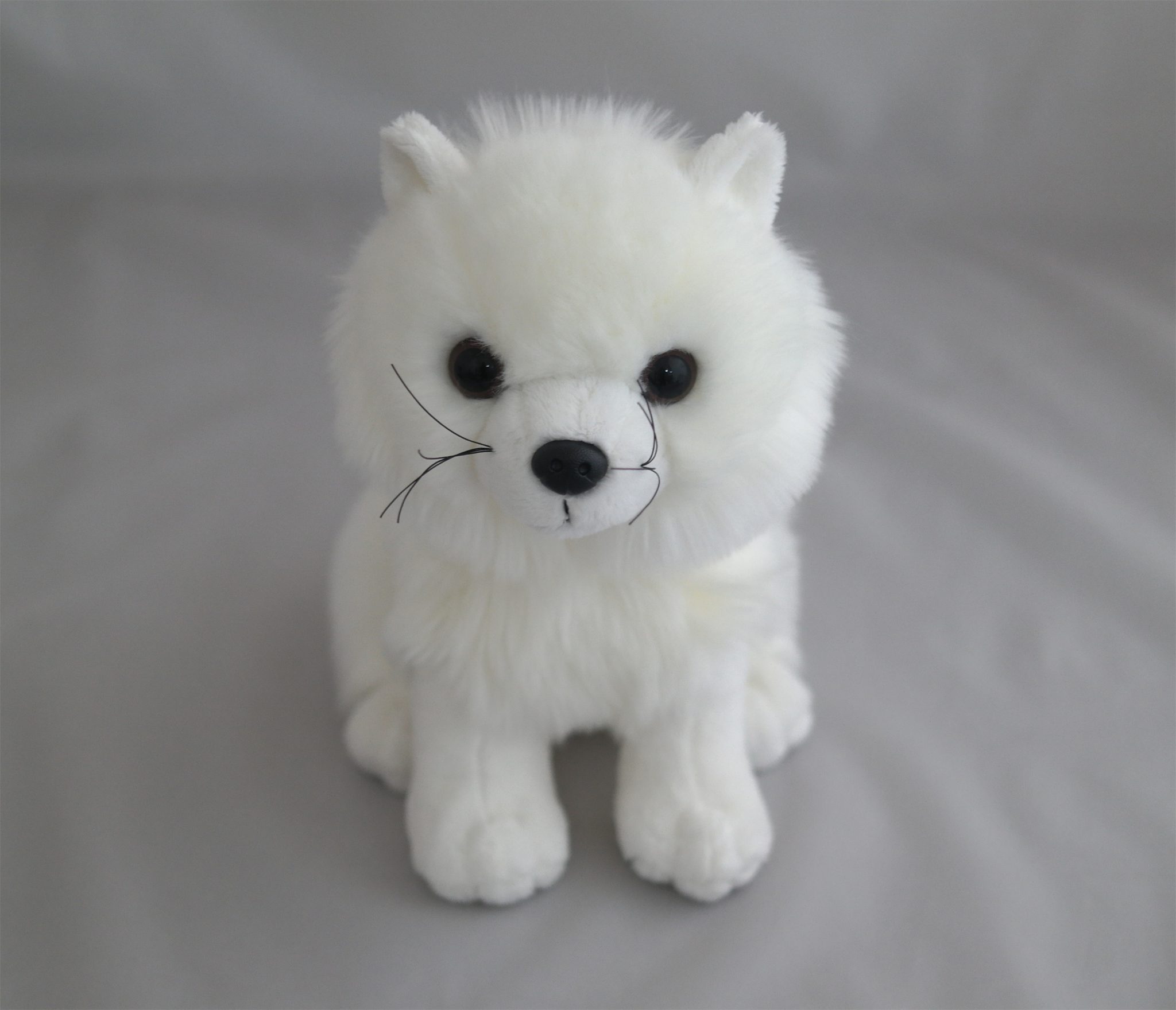 stuffed white wolf